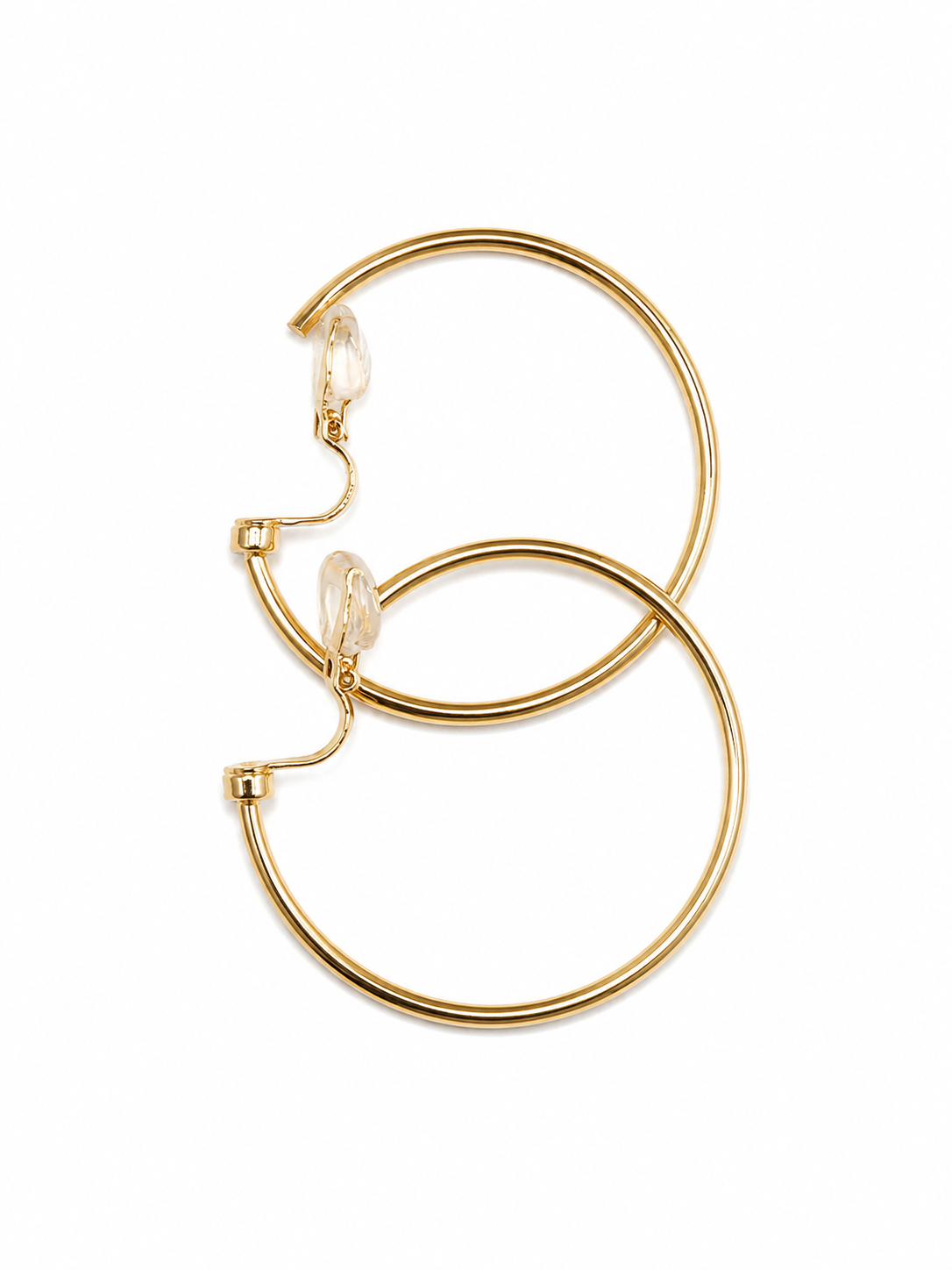 Close-up of 18KT gold-tone hoop clip-on earrings featuring a sleek finish and 316L stainless steel construction.