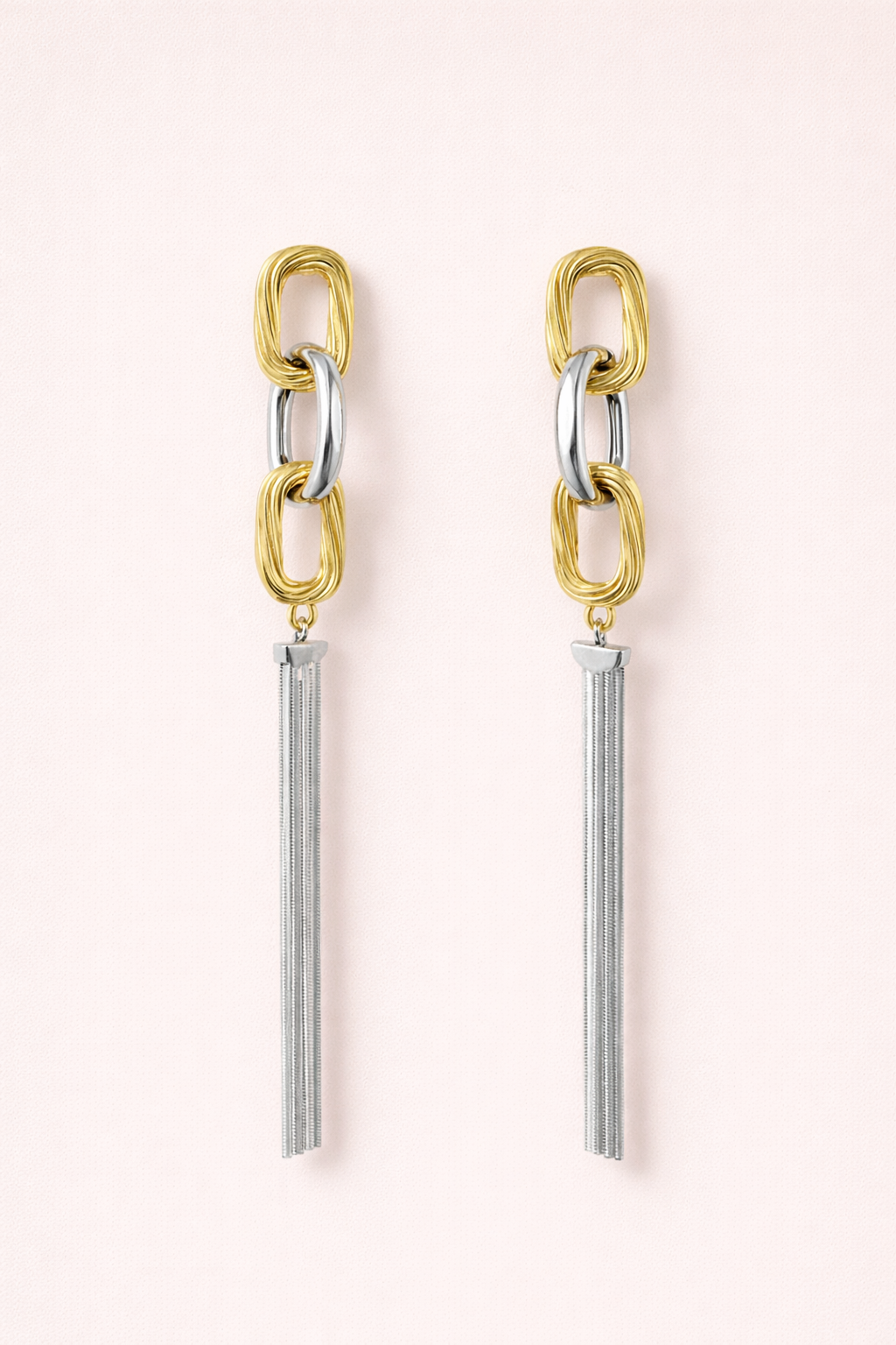 Anti-Tarnish, Ashaarya, Ashaarya Jewels, Ashaarya Jewellery, Pair of earrings with gold and silver chain design on a light pink background