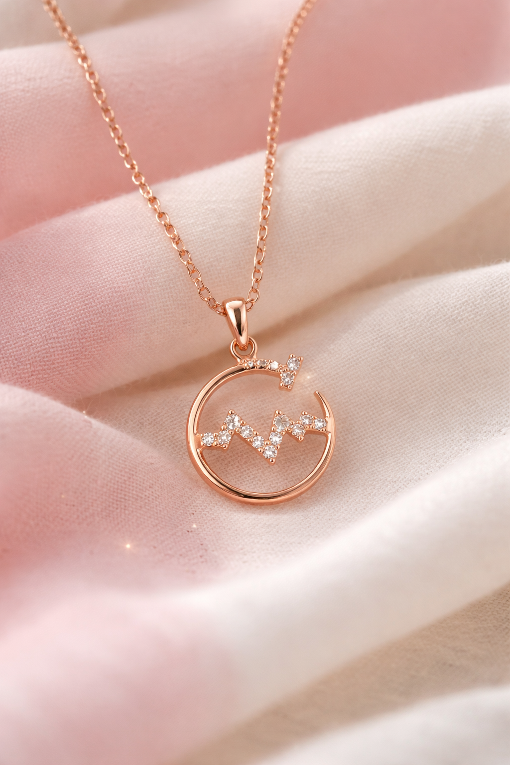 Anti-Tarnish, Ashaarya, Ashaarya Jewels, Ashaarya Jewellery, Rose gold necklace with a circular pendant on a soft pink background