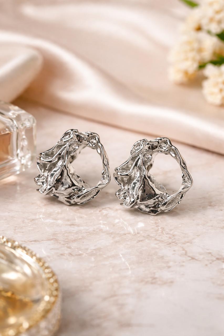 Anti-Tarnish, Ashaarya, Ashaarya Jewels, Ashaarya Jewellery, Silver hoop earrings on a soft fabric background