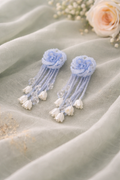 Anti-Tarnish, Ashaarya, Ashaarya Jewels, Ashaarya Jewellery, Pair of blue floral earrings on a light fabric background