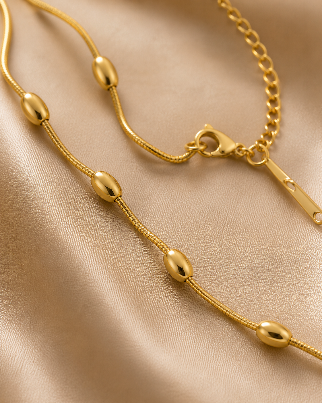 18kt gold tone anti-tarnish anklet for women featuring multi-layer chain and bead design, comfortable all-day wear jewellery