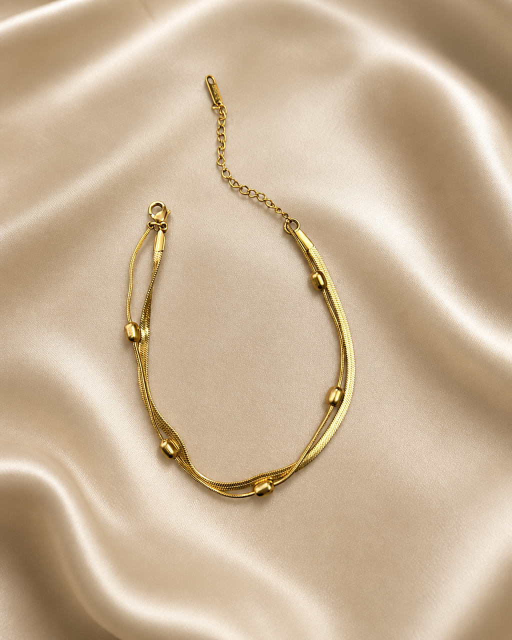 Anti-tarnish comfort anklet for women with adjustable chain closure, dual layer gold design, lightweight daily wear jewellery