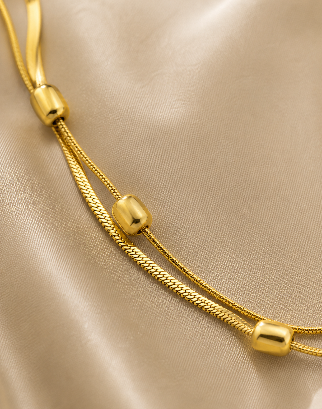 Anti-tarnish comfort jewellery anklet worn on foot, minimal gold dual chain design, lightweight and irritation-free wear for women