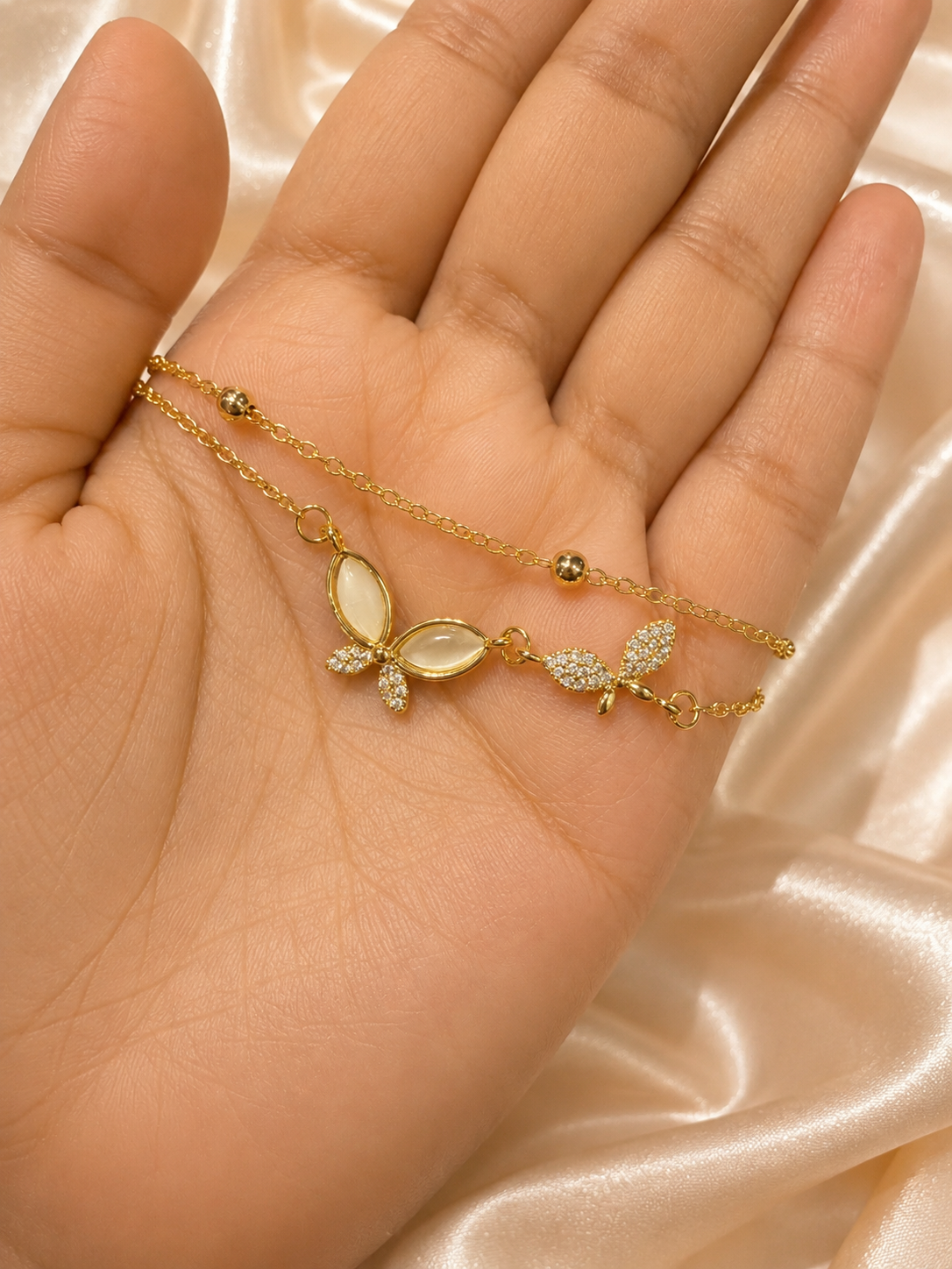 Lightweight butterfly bracelet for women by Ashaarya crafted in 316L stainless steel with 18KT gold plating for everyday wear.