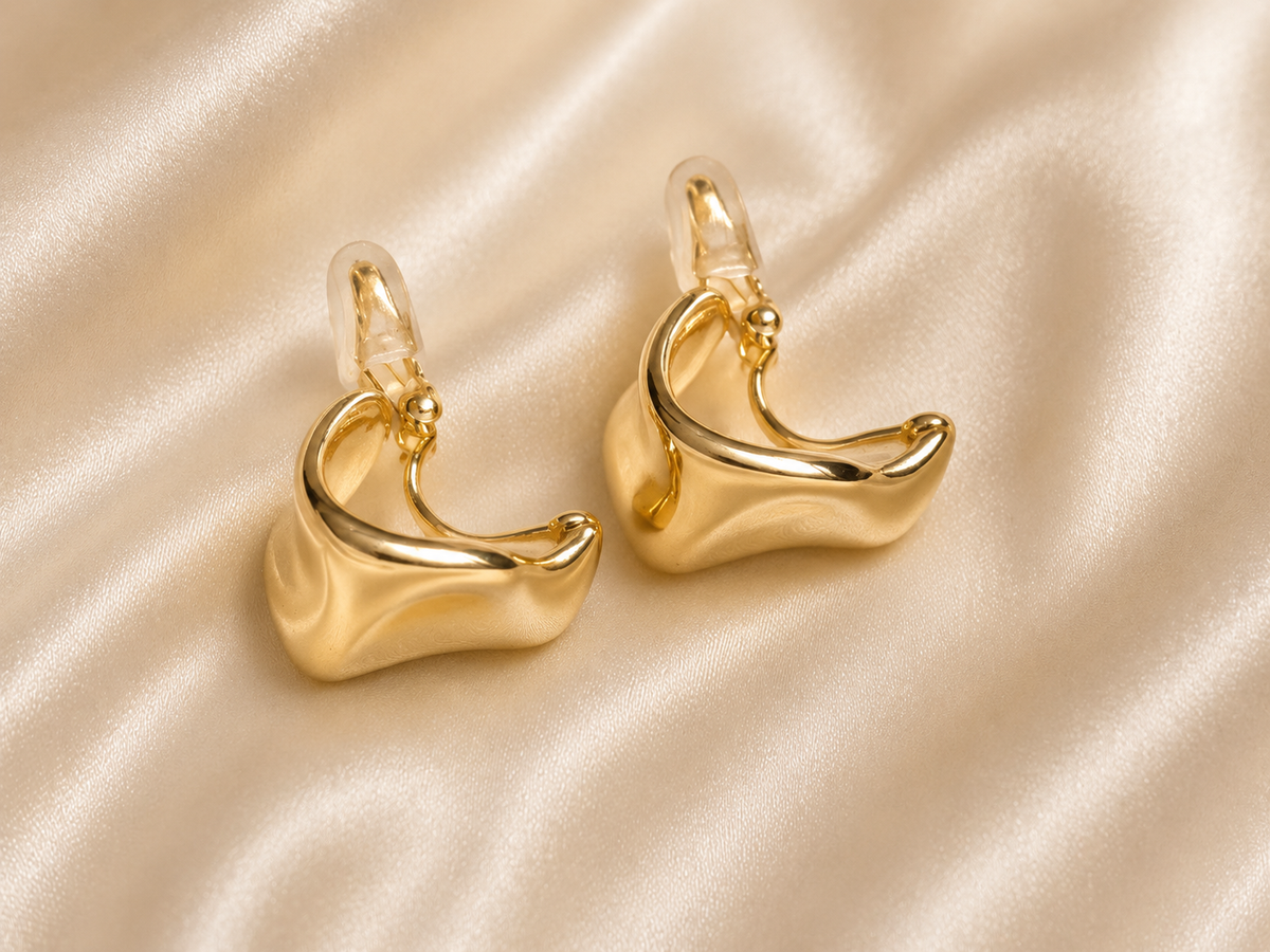 Gold clip-on earrings for women with a polished chunky curved design, ideal for a stylish no-piercing jewellery look