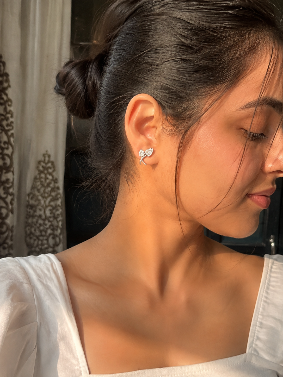 Anti-tarnish clip-on earrings for women with brilliant crystal stones and an elegant floral-inspired design