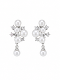 A pair of silver-toned drop earrings featuring white freshwater pearls and small clear cubic zirconia accents, displayed against a solid white background.  Anti-tarnish clip-on pearl earrings with crystal detailing by Ashaarya