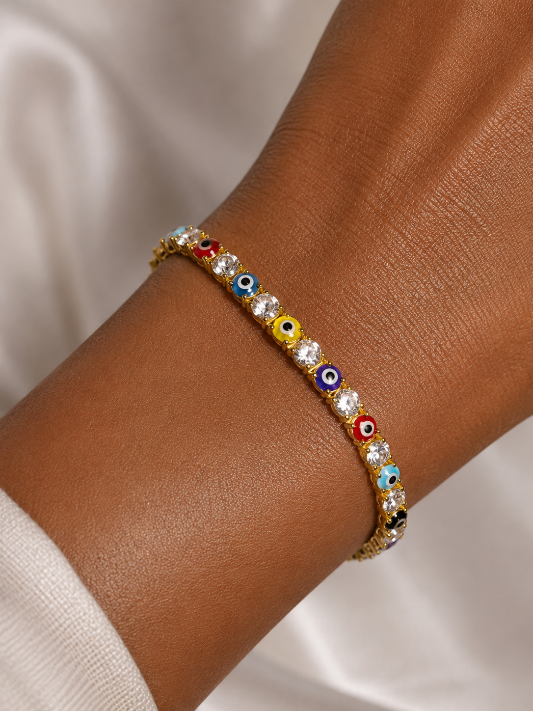Ashaarya Evil Eye Luxe Bracelet with colourful motifs and American diamonds styled for everyday and occasion wear.
