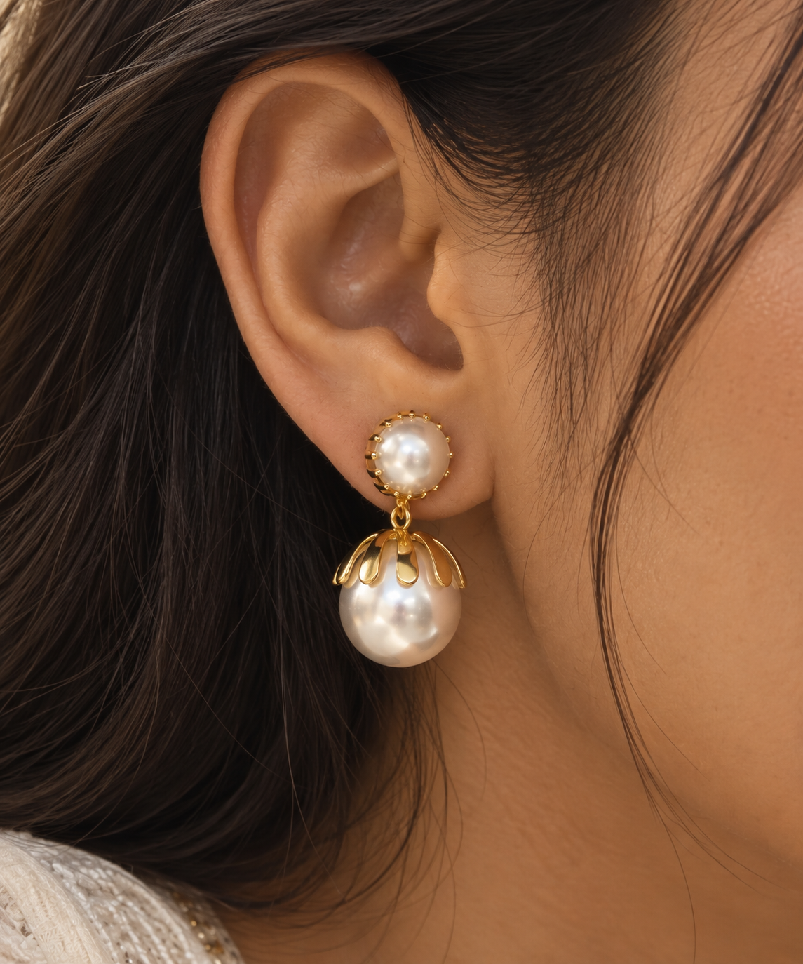 Anti-tarnish clip-on pearl earrings by Ashaarya, elegant dangling earrings with white pearl drops and gold detailing for Indian and Western outfits