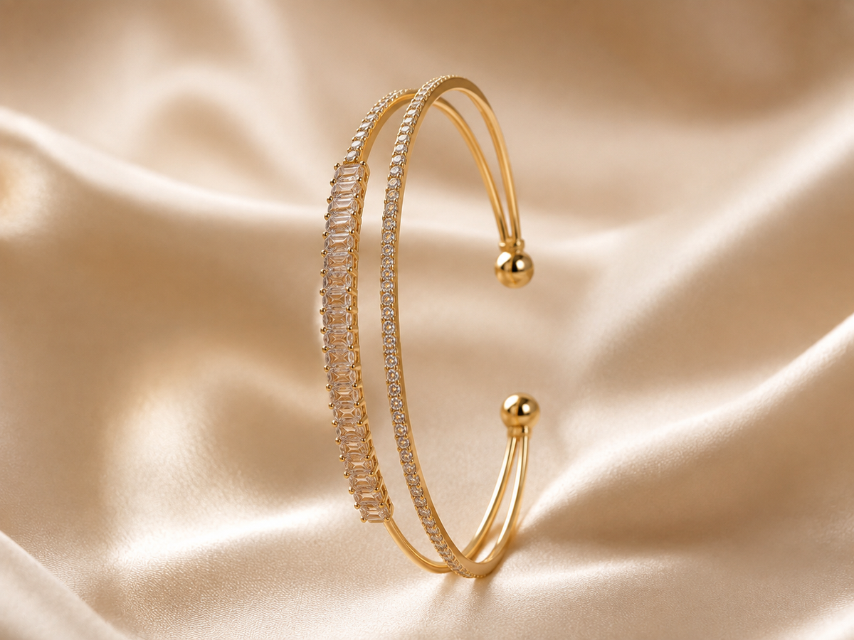 Anti-tarnish gold crystal open cuff bracelet for women featuring dual rows of sparkling stones and elegant gold-tone detailing