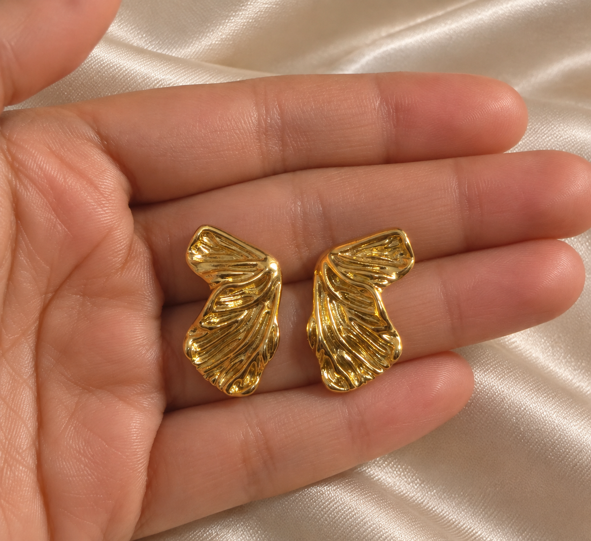 Anti-tarnish gold fan-inspired clip-on earrings for women with detailed textured lines and a polished finish, ideal for everyday and occasion styling