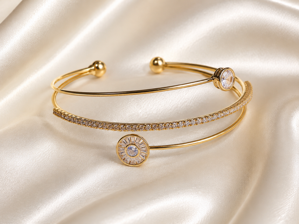 Anti-tarnish gold layered bracelet for women with delicate crystal detailing and a minimalist open cuff design