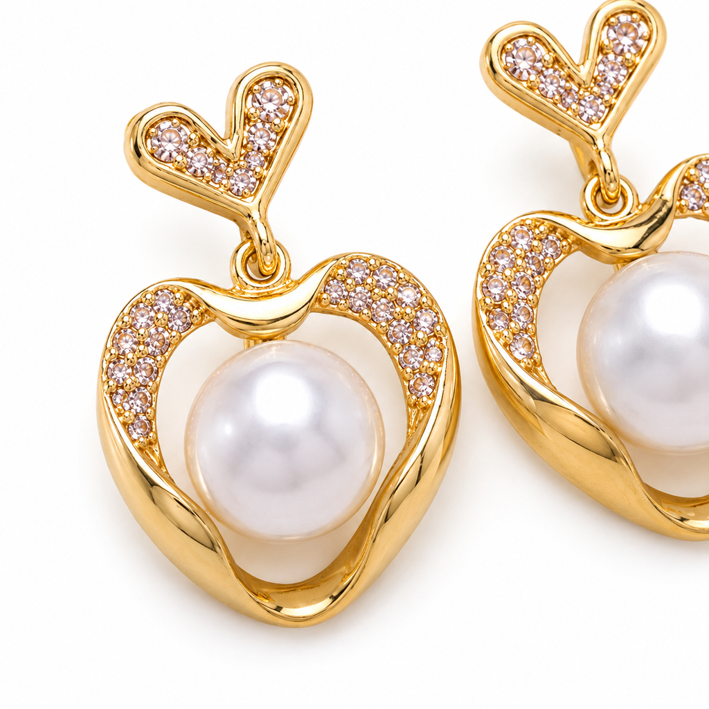 Anti-tarnish gold pearl earrings for women featuring heart-shaped detailing, crystal accents and a classic pearl centre