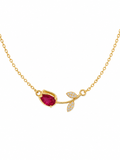 Anti-tarnish gold ruby leaf necklace for women featuring a delicate chain, red gemstone and sparkling leaf pendant