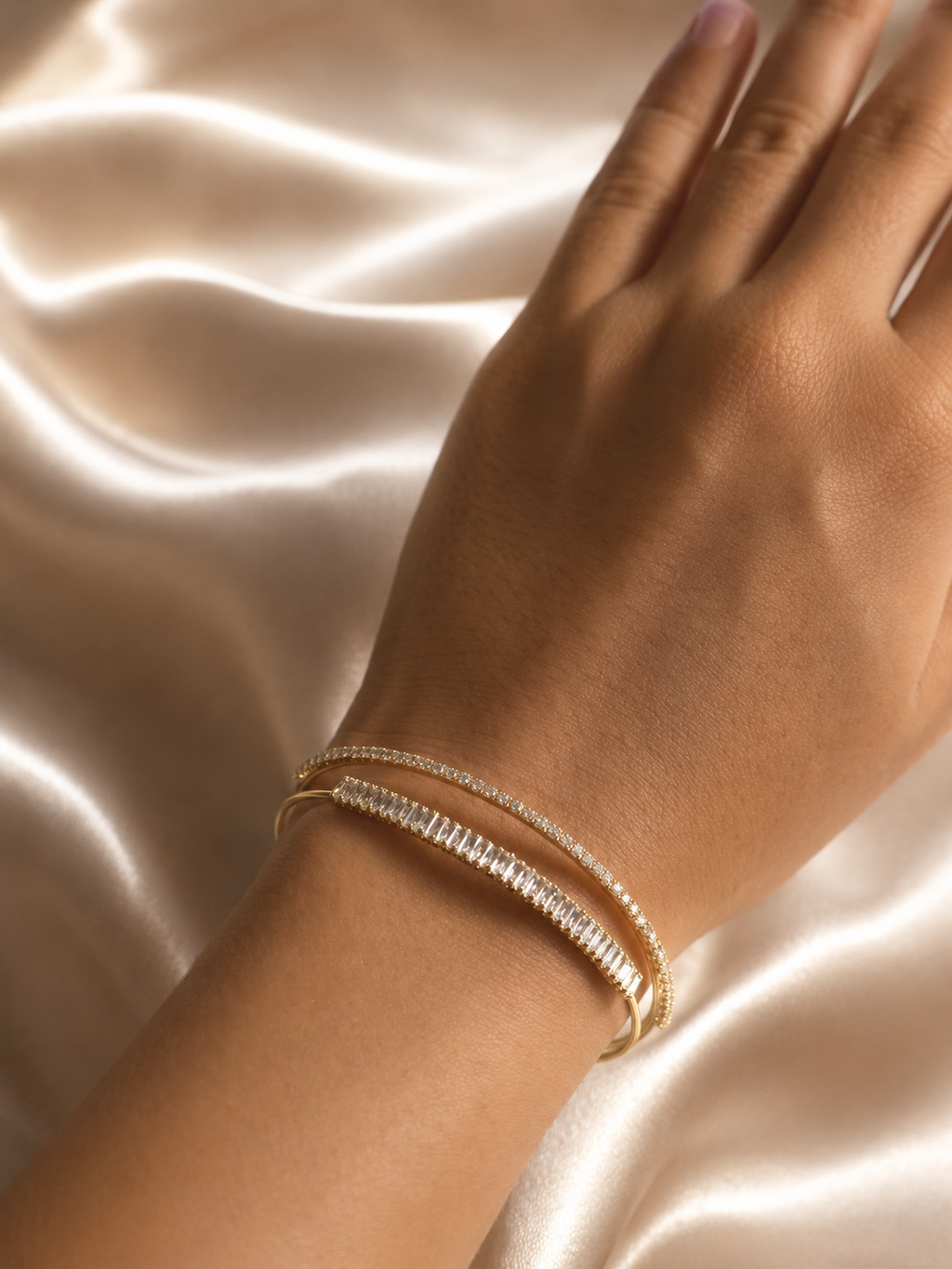 Anti-tarnish gold statement cuff bracelet with baguette and round crystal accents, creating a sophisticated demi-fine jewellery look