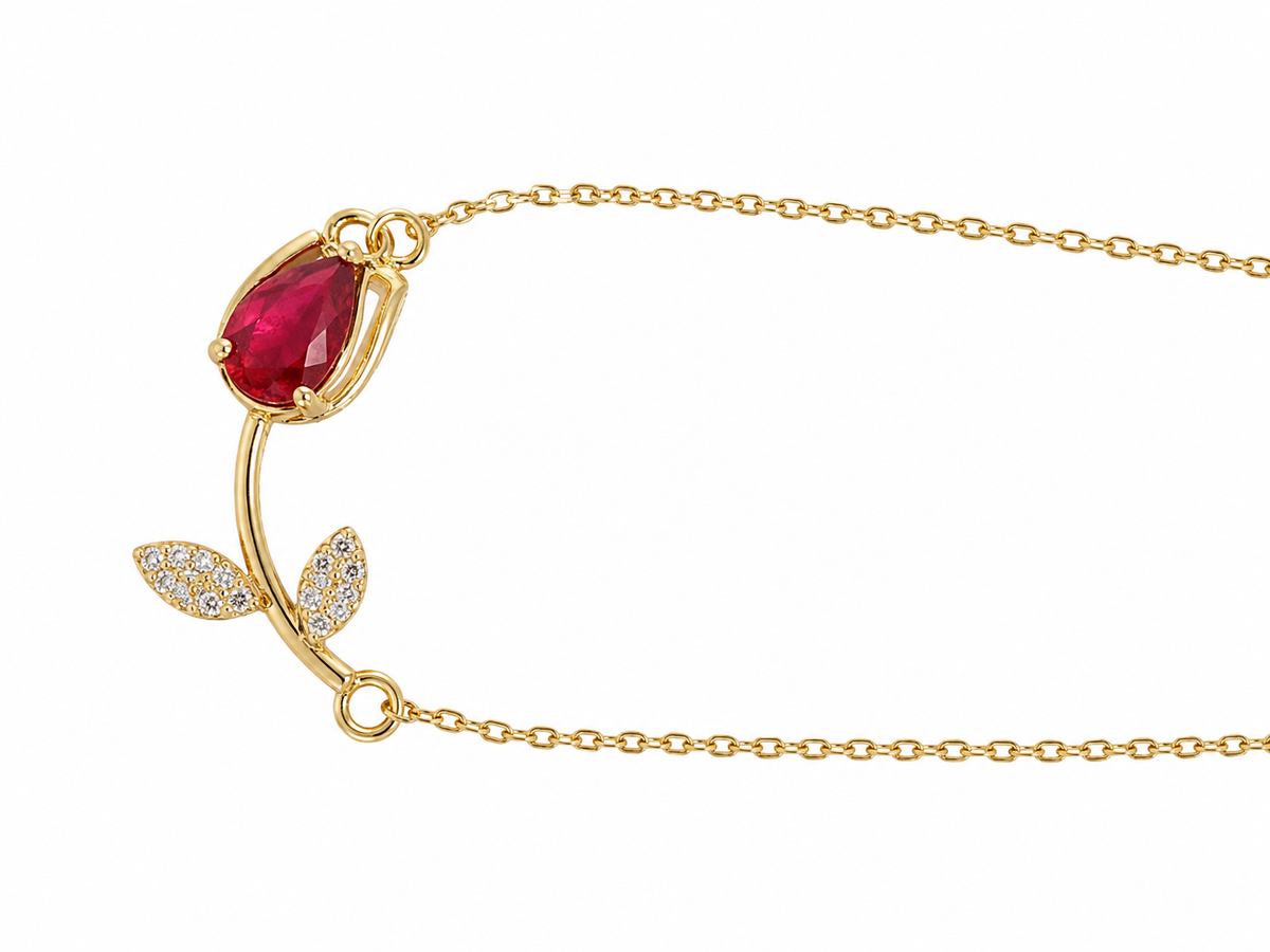 Anti-tarnish lightweight necklace designed as comfort jewellery with a delicate gold chain, red gemstone and crystal leaf accent