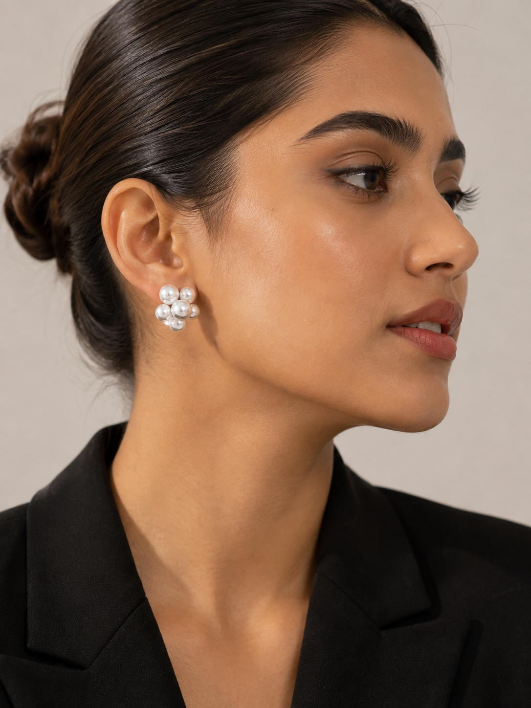 Anti-tarnish pearl clip-on earrings for women with a delicate silver-tone setting and clustered pearl detailing