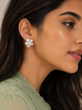 Anti-tarnish pearl flower clip-on earrings featuring layered white pearls and a silver-tone floral design