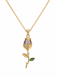Anti-tarnish purple stone leaf necklace for women featuring a delicate gold-tone chain, purple gemstone pendant and green leaf detail