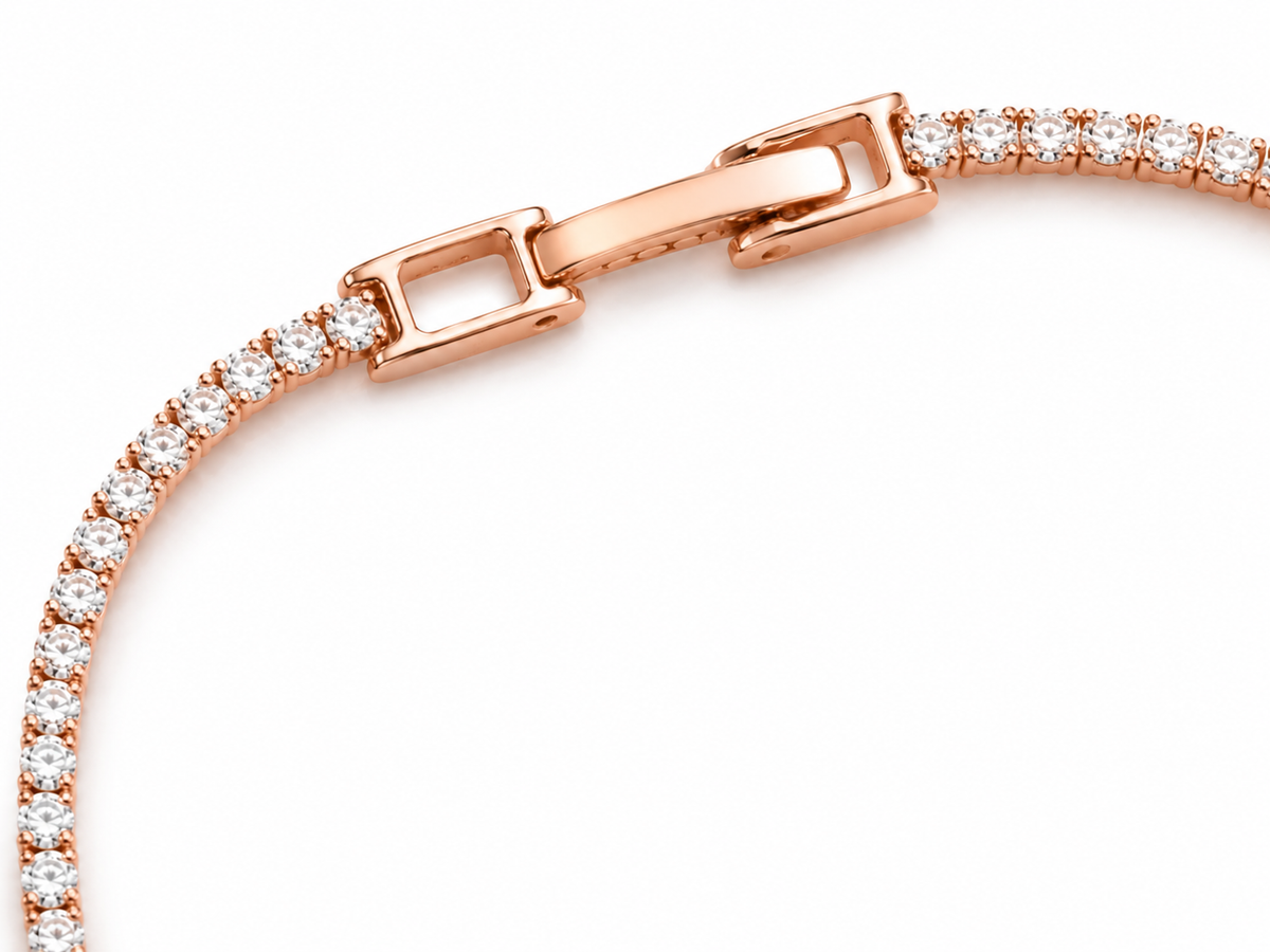 Anti-tarnish rose gold tennis bracelet for women featuring a continuous row of sparkling clear stones and an adjustable length extender