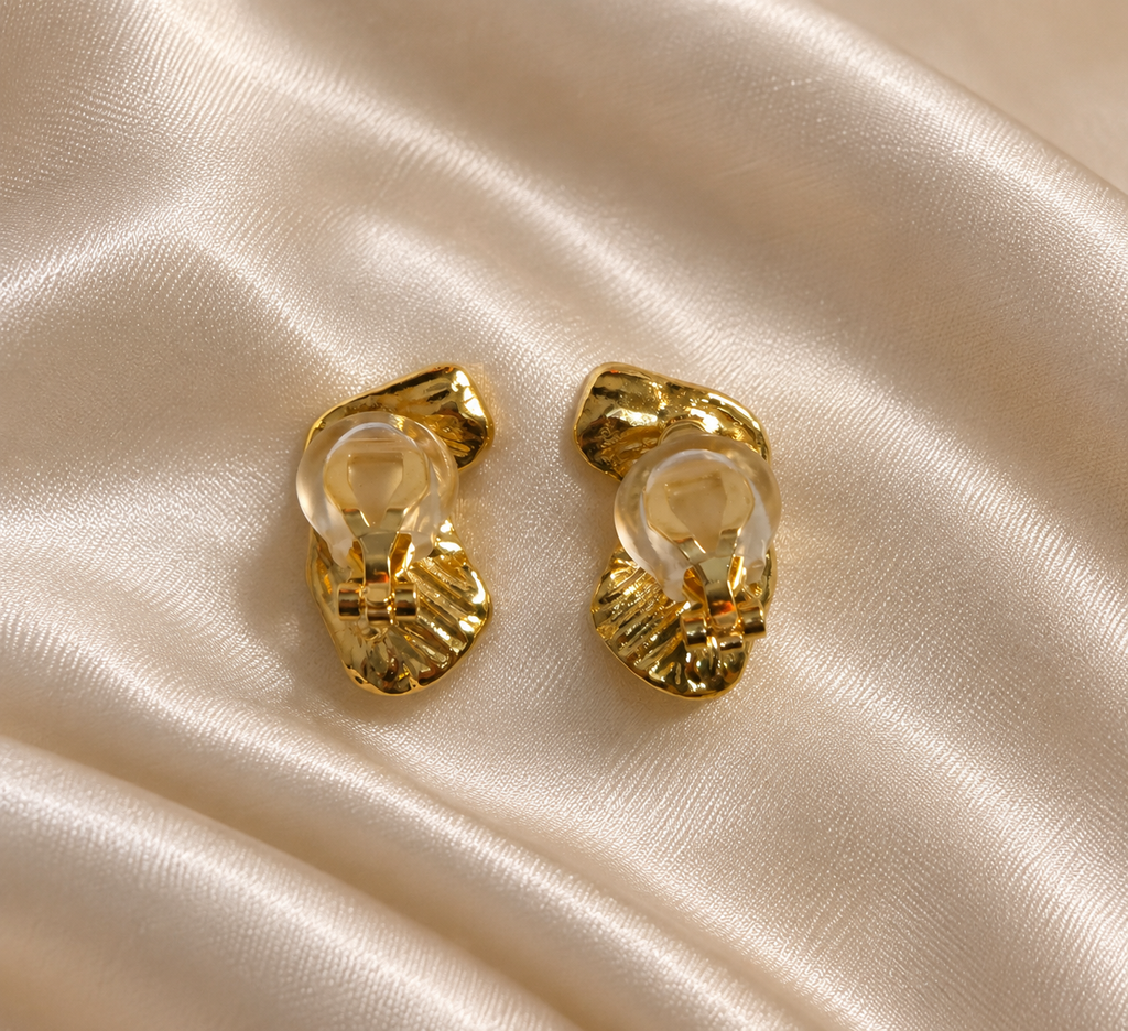 Anti-tarnish gold earrings for non-pierced ears featuring a sophisticated sculpted design and comfortable clip-on fastening