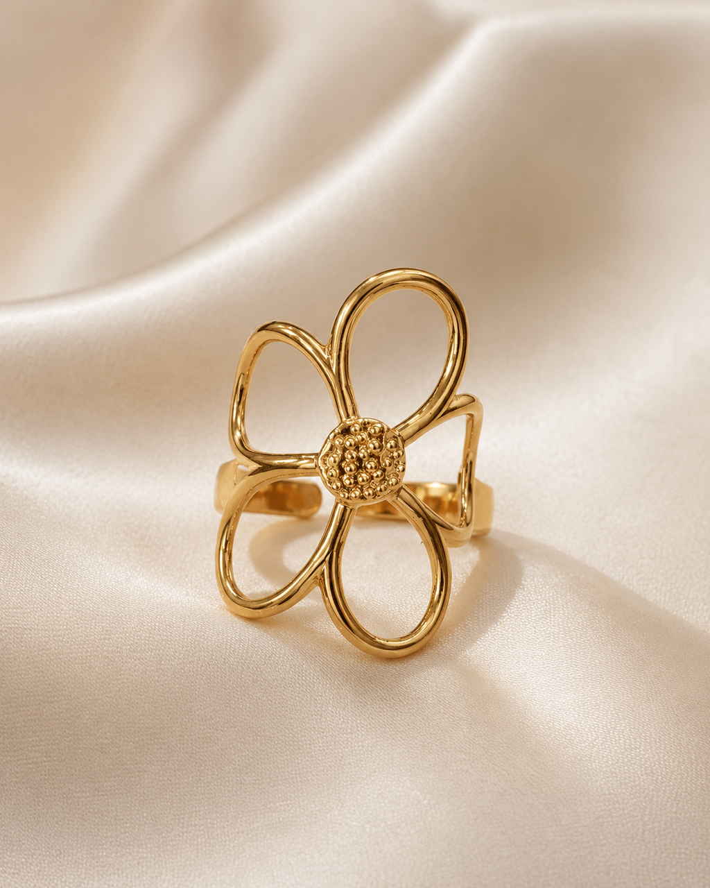 Close-up of Bloom Adjustable Statement Ring by Ashaarya highlighting textured floral centre and gold-tone finish
