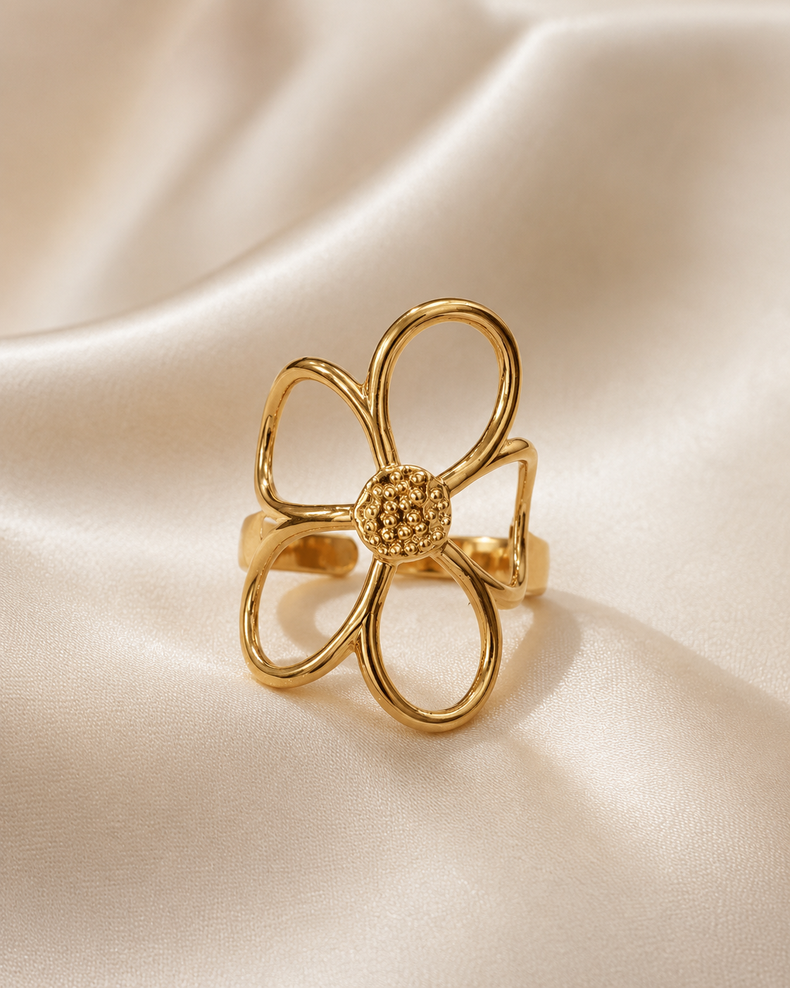 Close-up of Bloom Adjustable Statement Ring by Ashaarya highlighting textured floral centre and gold-tone finish