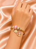 Blossom Tree Charm Bracelet by Ashaarya featuring Tree of Life charm, pink enamel flower charm, crystal beads, anti-tarnish finish, lightweight comfort jewellery for women.