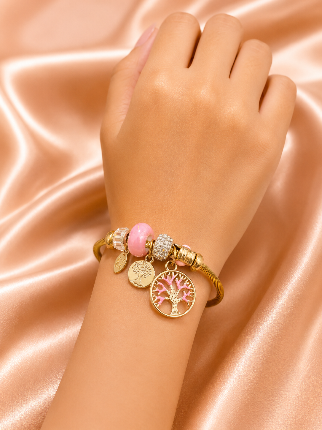 Blossom Tree Charm Bracelet by Ashaarya featuring Tree of Life charm, pink enamel flower charm, crystal beads, anti-tarnish finish, lightweight comfort jewellery for women.