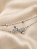 bow bracelet, bow jewellery, bow bracelet for women, anti tarnish bracelet, silver bracelet women, dainty bracelet, everyday bracelet, lightweight bracelet, adjustable bracelet, minimal bracelet, double chain bracelet, crystal bracelet, gift for girlfriend, gift for sister, office wear jewellery, comfort jewellery, stackable bracelet, skin friendly bracelet, luxury bracelet, women bracelet