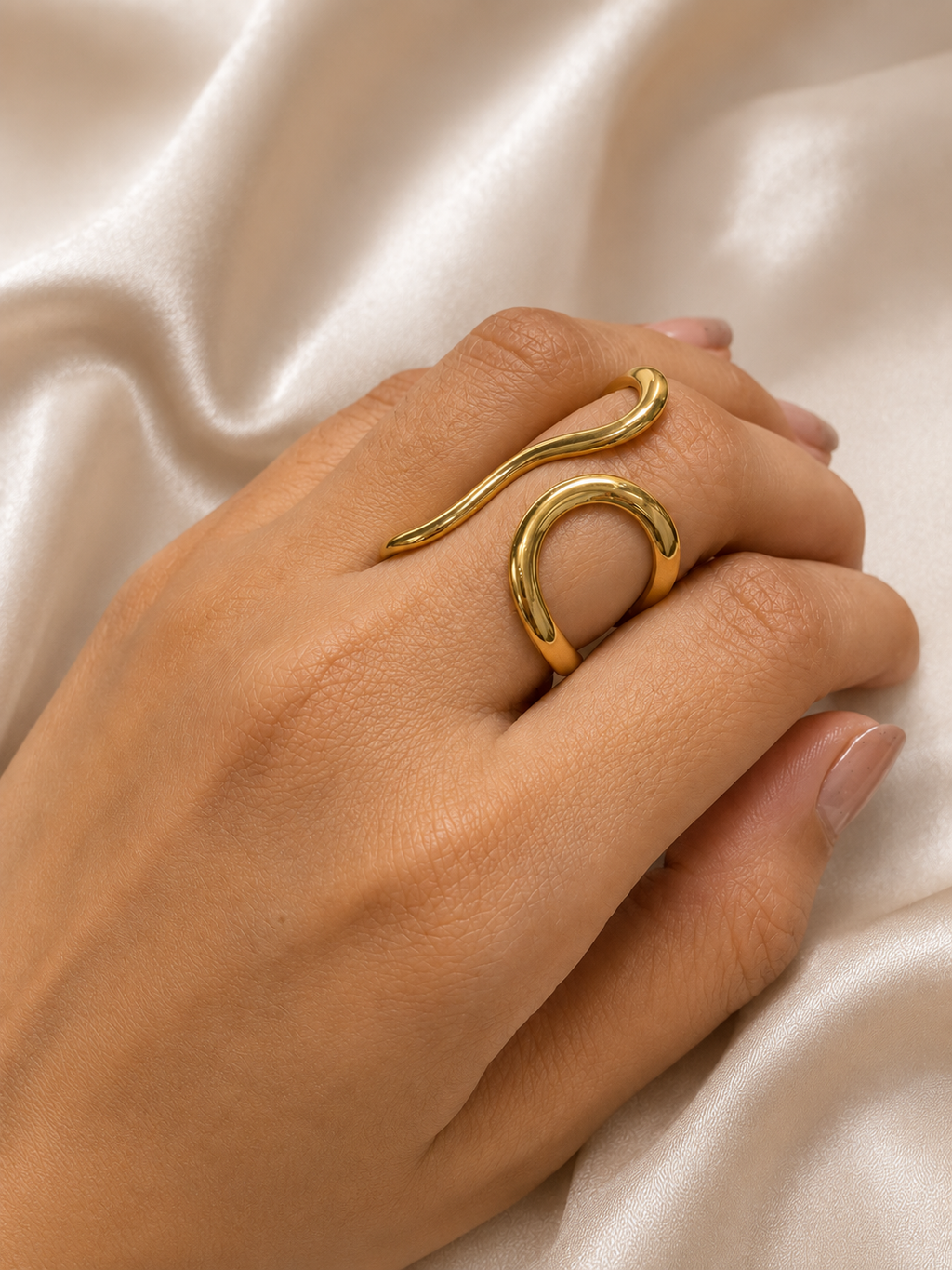 Élan Wave Ring by Ashaarya worn on Indian female hand with nude manicure showcasing adjustable gold ring
