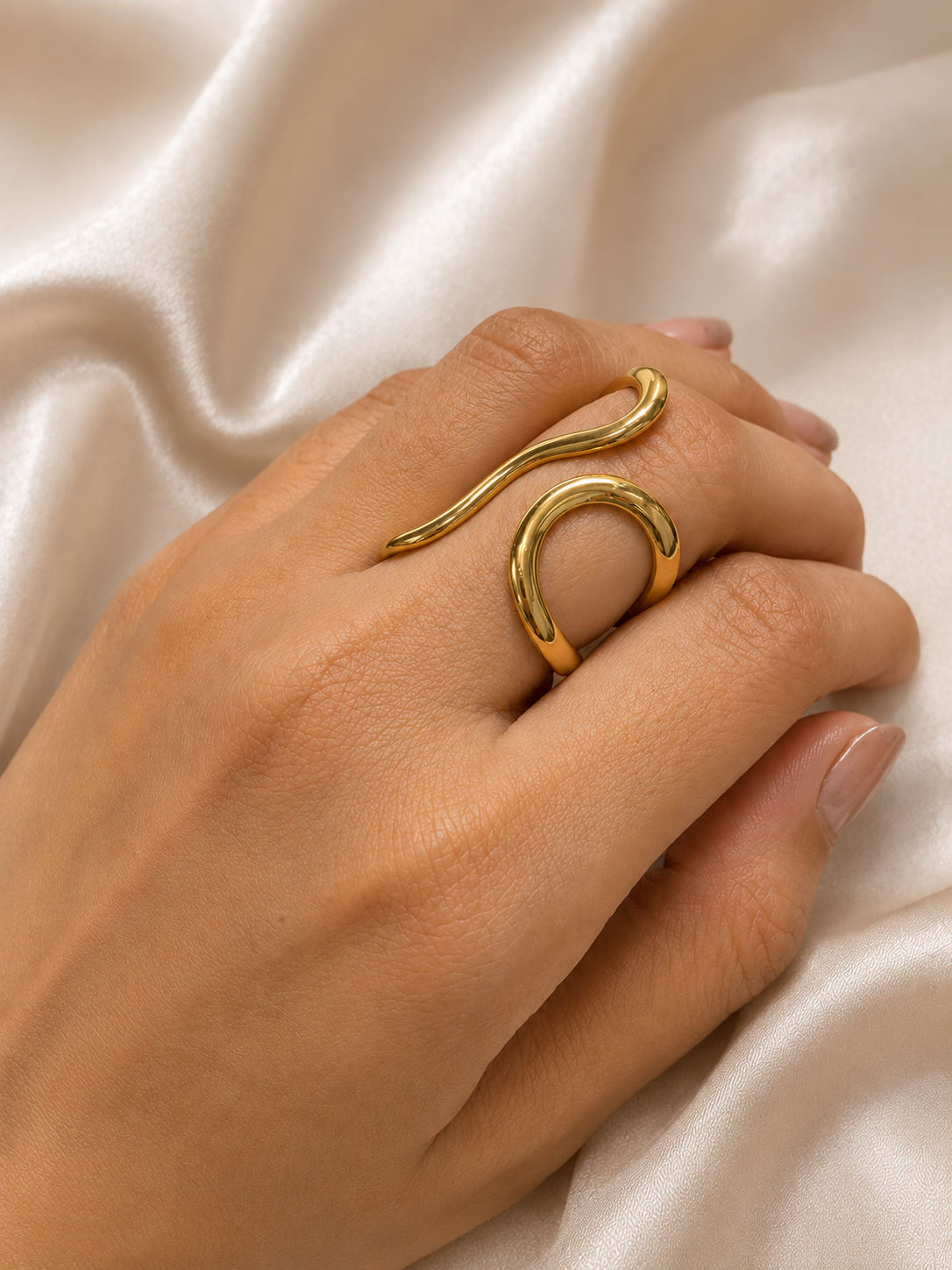 Élan Wave Ring by Ashaarya worn on Indian female hand with nude manicure showcasing adjustable gold ring