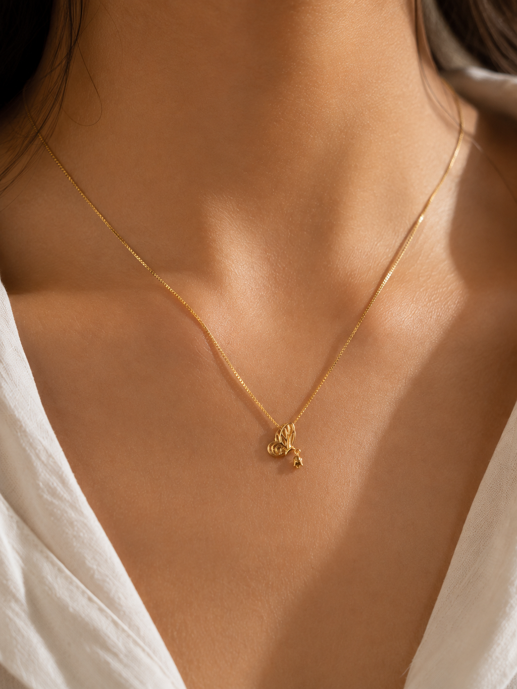 Lightweight 316L stainless steel necklace with an 18KT gold-tone finish styled for everyday wear.