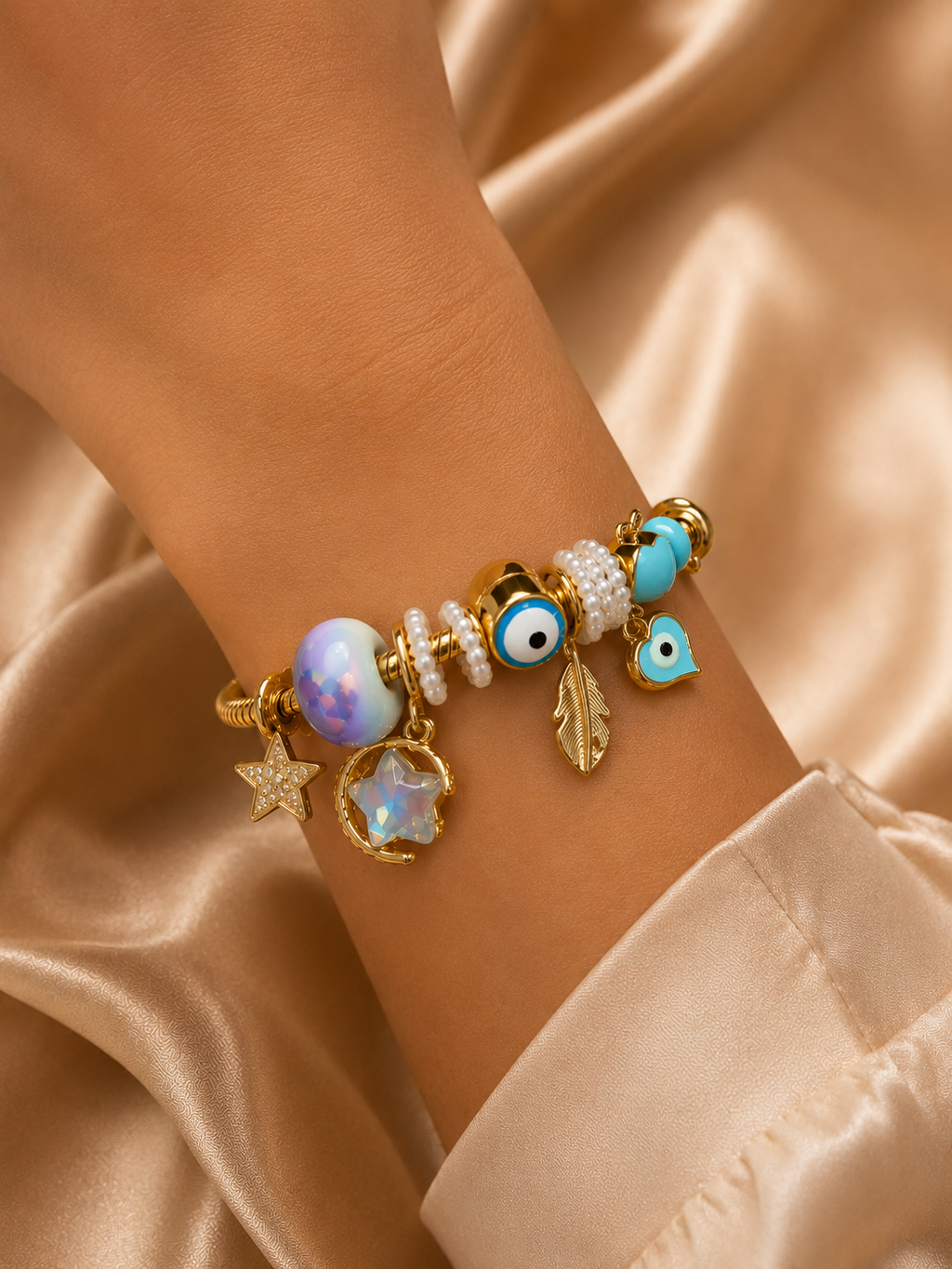 Aesthetic evil eye moon and star charm bracelet for women with pastel blue accents and lightweight comfort jewellery styling.