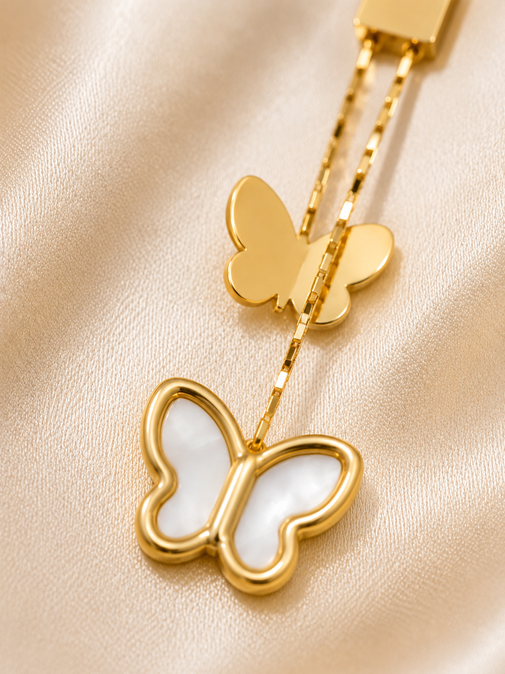 butterfly earrings, drop earrings, dangler earrings, 18kt gold tone, anti tarnish jewellery, stainless steel earrings, lightweight earrings, hypoallergenic earrings, mother of pearl, butterfly jewellery, everyday luxury, elegant earrings, premium jewellery, comfort jewellery, Ashaarya