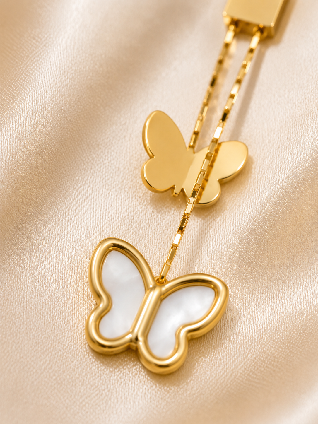 butterfly earrings, drop earrings, dangler earrings, 18kt gold tone, anti tarnish jewellery, stainless steel earrings, lightweight earrings, hypoallergenic earrings, mother of pearl, butterfly jewellery, everyday luxury, elegant earrings, premium jewellery, comfort jewellery, Ashaarya