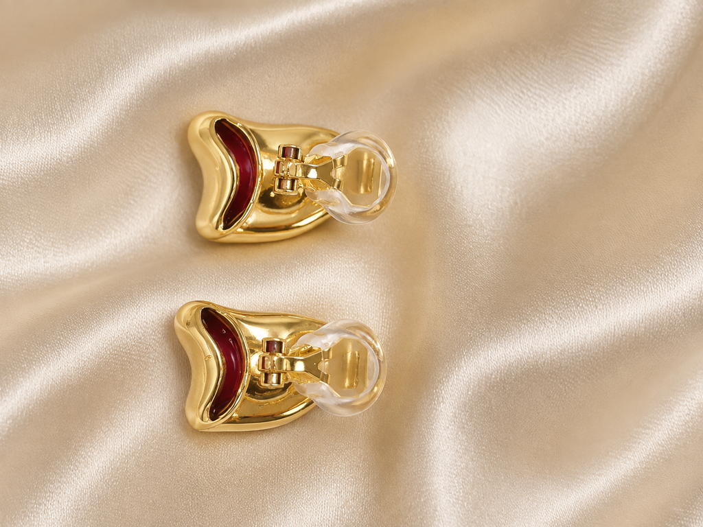 Gold hoop clip-on earrings for girls featuring a modern curved silhouette and elegant polished finish without requiring pierced ears
