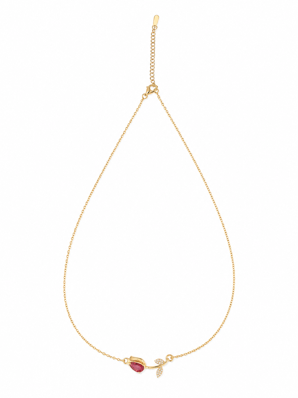 Gold leaf necklace for women featuring a red gemstone accent and sparkling leaf detail, designed for elegant everyday wear