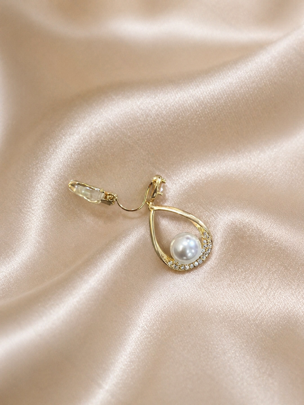 Close-up of anti-tarnish pearl dangling earrings, minimal gold teardrop style comfort jewellery designed for all-day wear by Ashaarya
