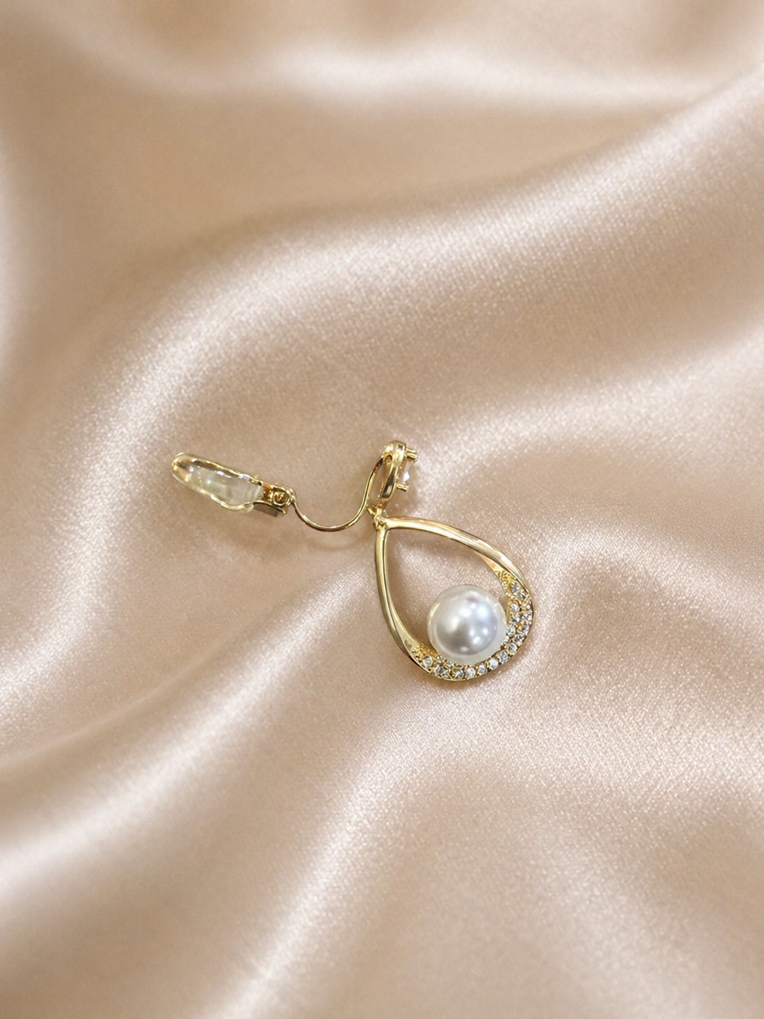 Close-up of anti-tarnish pearl dangling earrings, minimal gold teardrop style comfort jewellery designed for all-day wear by Ashaarya