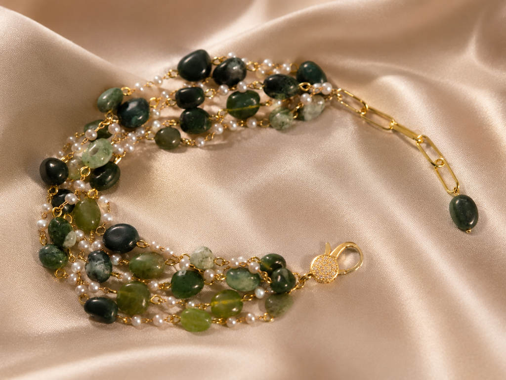 Green natural stone and pearl bracelet for women with multiple gemstone strands and delicate gold-tone chain accents