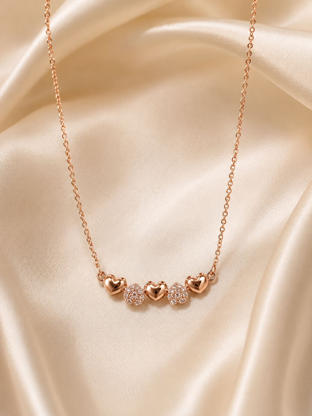 Heartstrings Necklace by Ashaarya in 18KT rose gold tone with crystal heart design