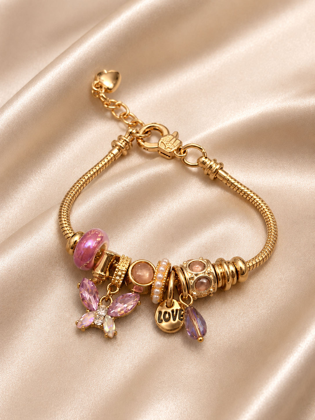 Detailed view of Lavender Daydream Charm Bracelet by Ashaarya crafted from 316L stainless steel with 18KT gold tone.daydream-charm-bracelet-details-by-ashaarya