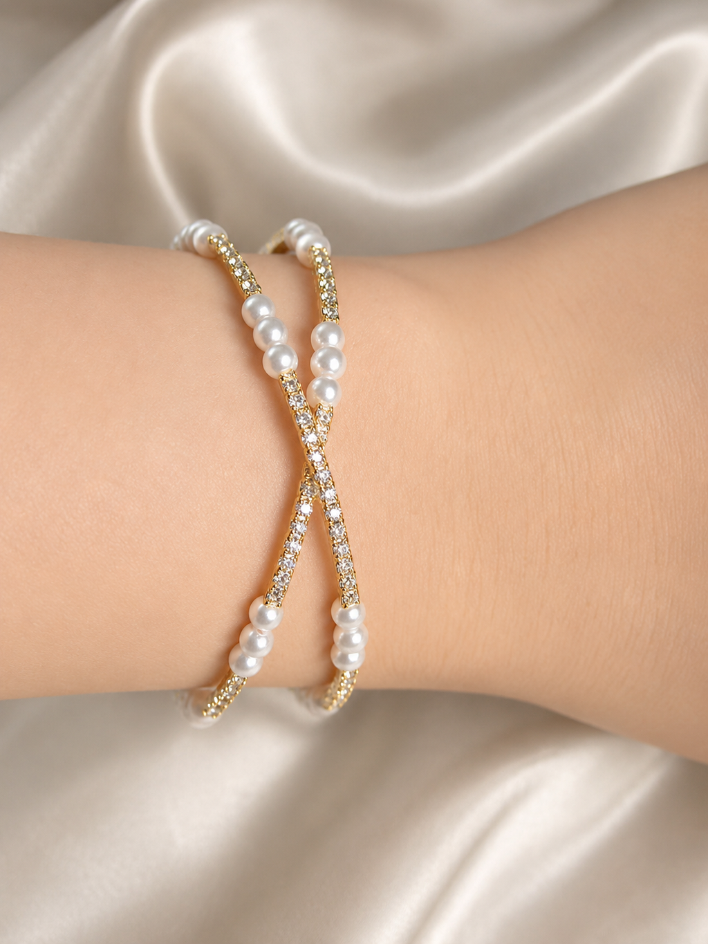 Lightweight pearl cuff bracelet with gold-tone detailing and American diamonds by Ashaarya.