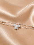 The Becoming Bracelet by Ashaarya featuring a sparkling silver butterfly charm on a dual-chain anti-tarnish 316L stainless steel bracelet for women.