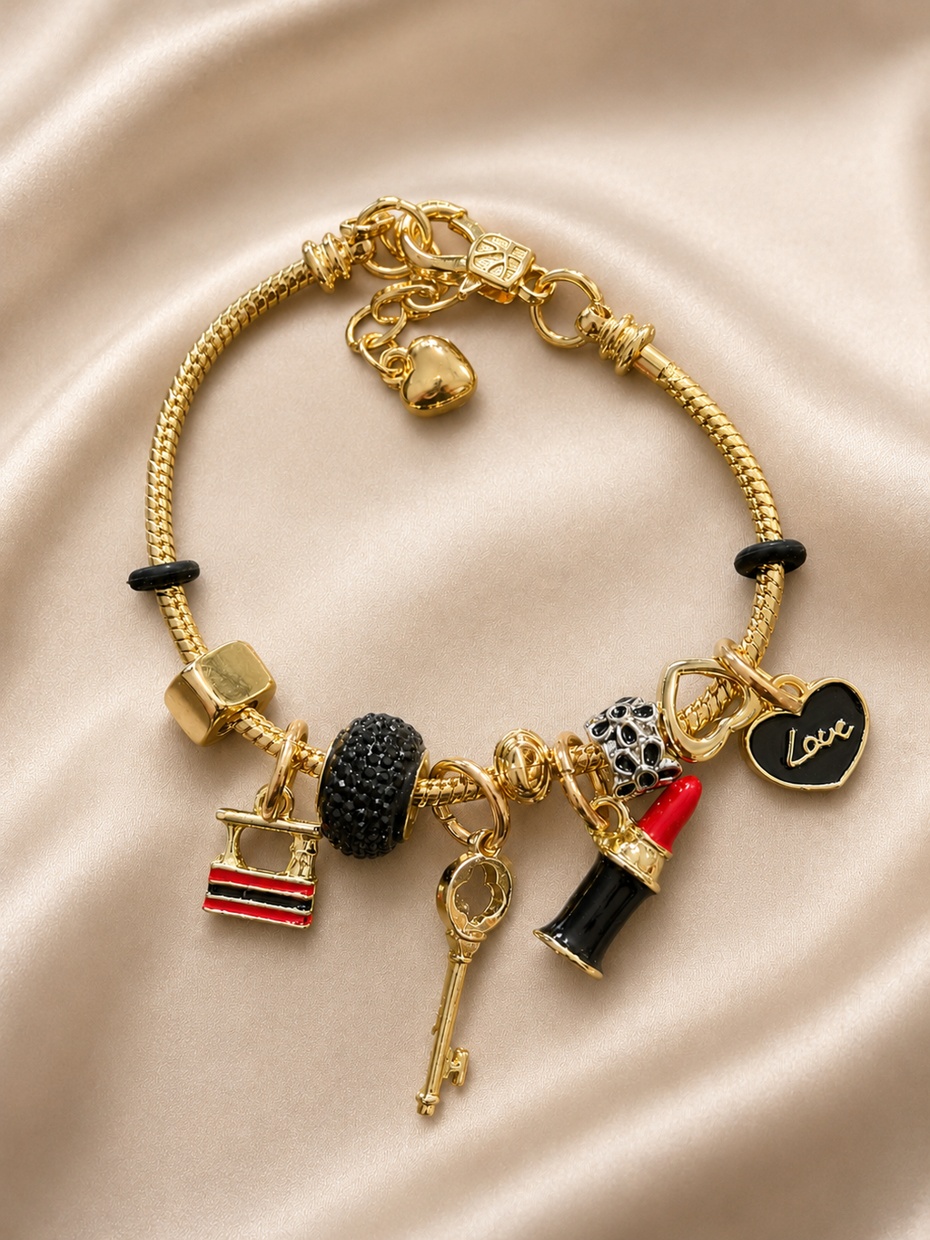 Anti-tarnish gold charm bracelet with lipstick key handbag and heart charms for women