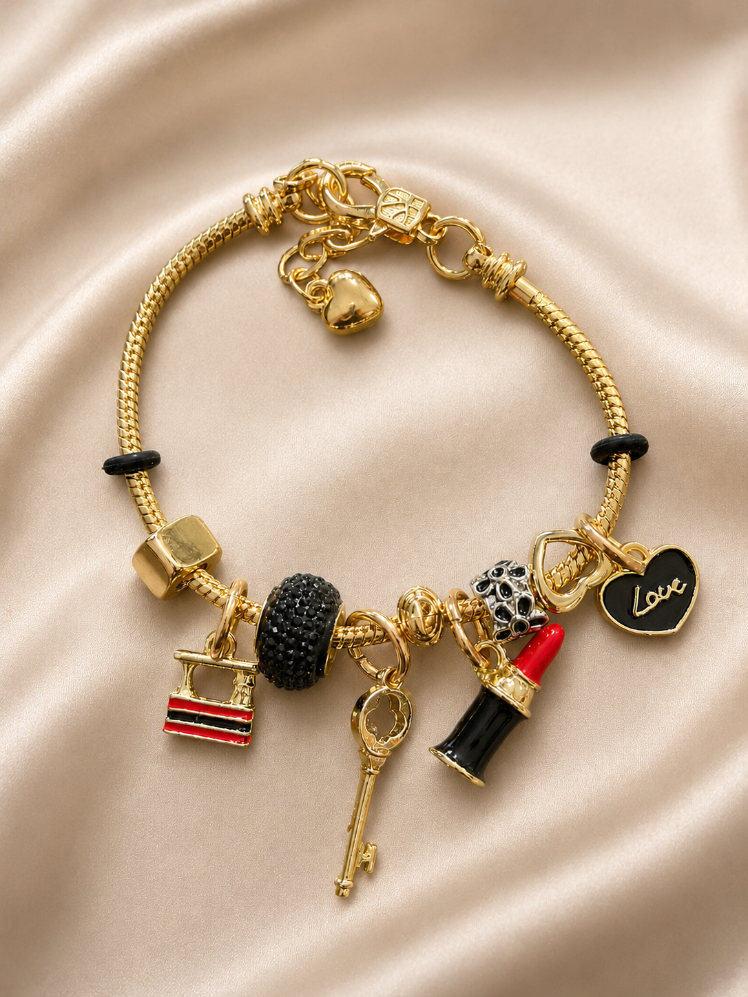 Anti-tarnish gold charm bracelet with lipstick key handbag and heart charms for women