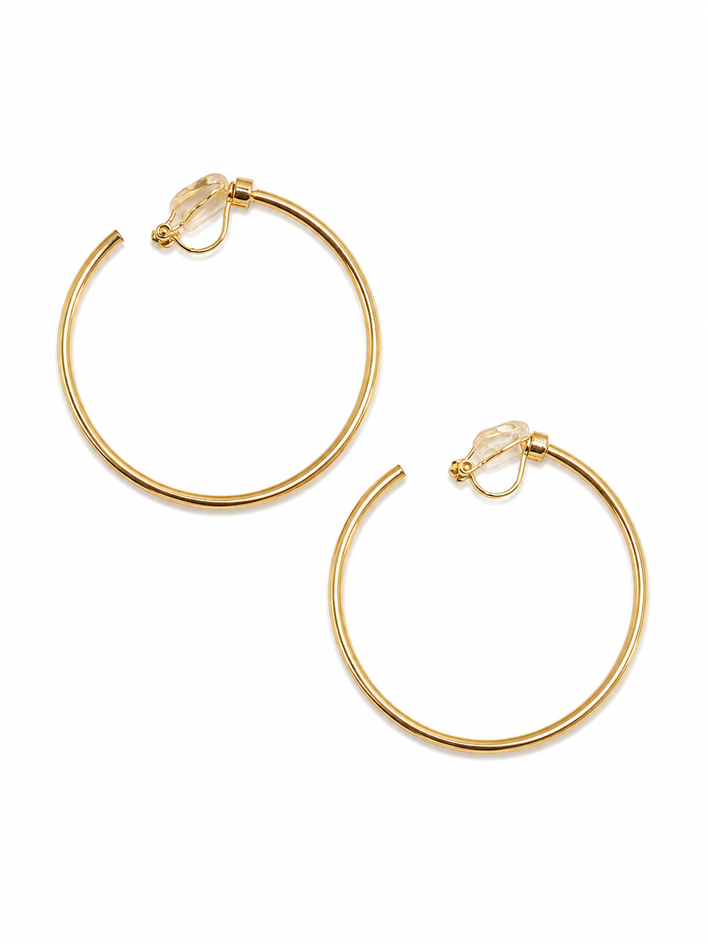 Minimalist gold hoop clip-on earrings in an elegant 18KT gold tone, ideal for women seeking everyday demi-fine comfort jewellery.