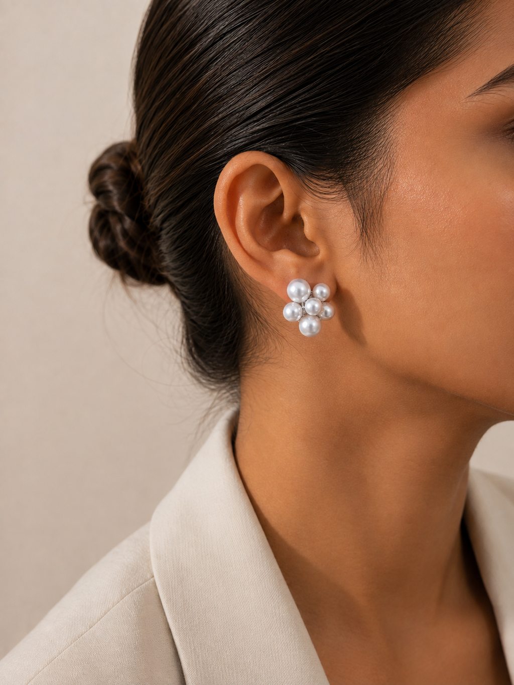 Pearl clip-on earrings for women with multiple lustrous white pearls arranged in an elegant flower-inspired design